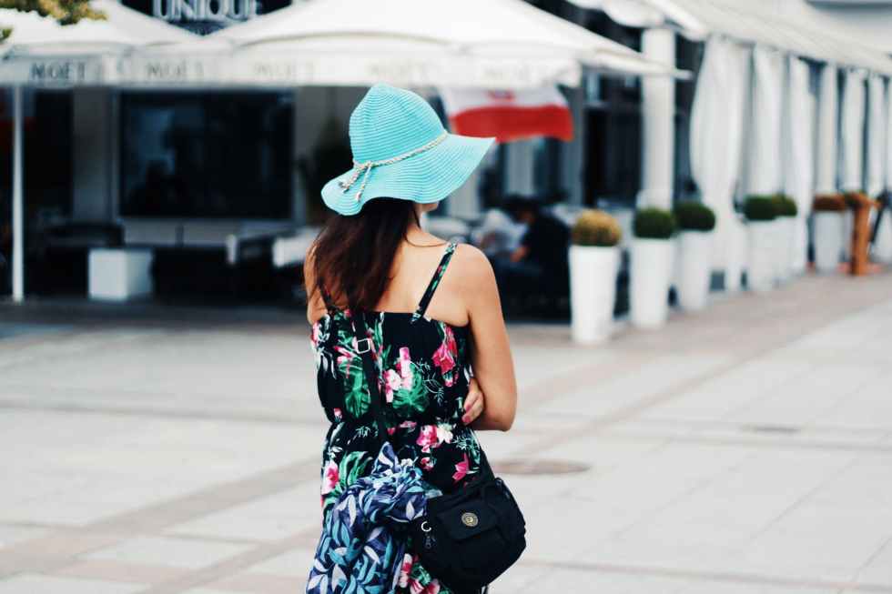 woman wearing multicolored floral camisole dress